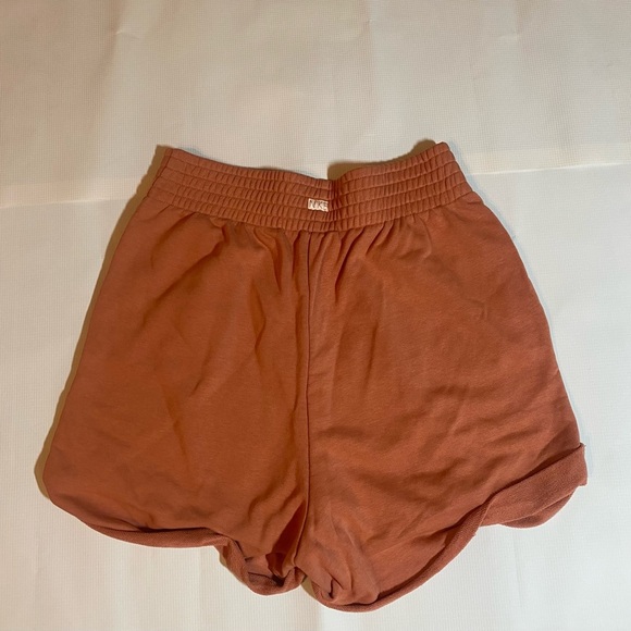 Nike Tinted Orange Athletic Shorts Elastic Waistband Soft Fabric - Picture 2 of 3